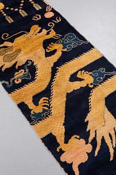 MATTO, PILLAR RUG, an old Chinese, possibly Ningxia, ca 236,5-237 x 76,5 cm (as well as ca 1 cm flat weave at the ends).