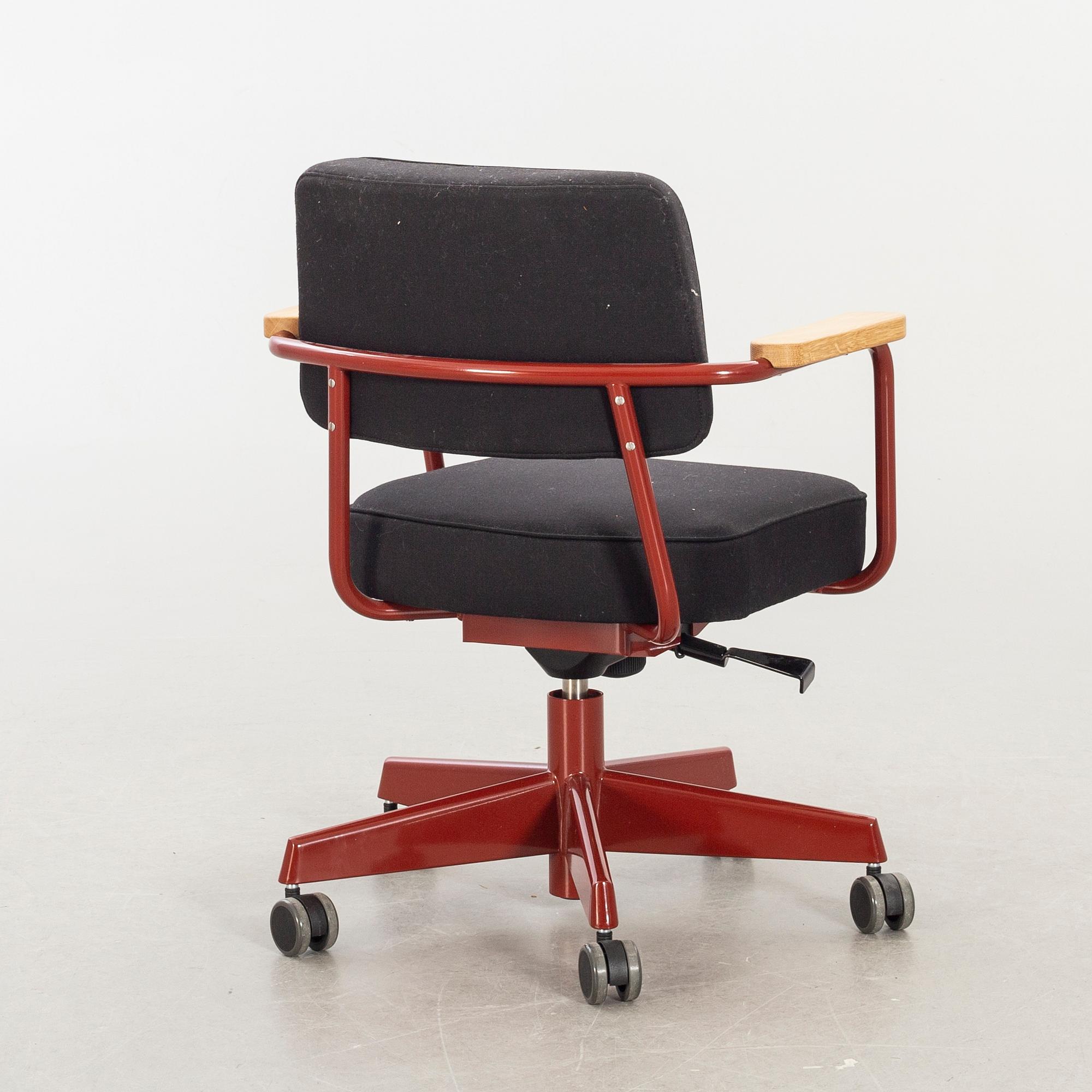 A Fauteuil Direction Pivotan office chair by JEAN PROUVÉ for VITRA.