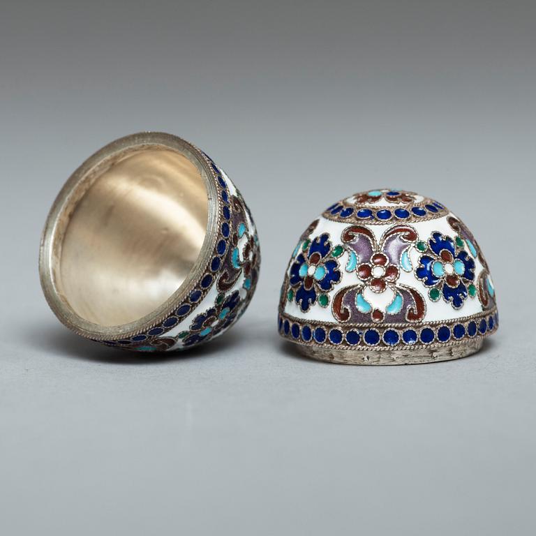 A Russian late 19th/early 20th century silver-gilt and enamel egg.