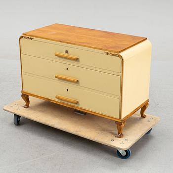 An elm veneeded chest of drawers, 1940's.