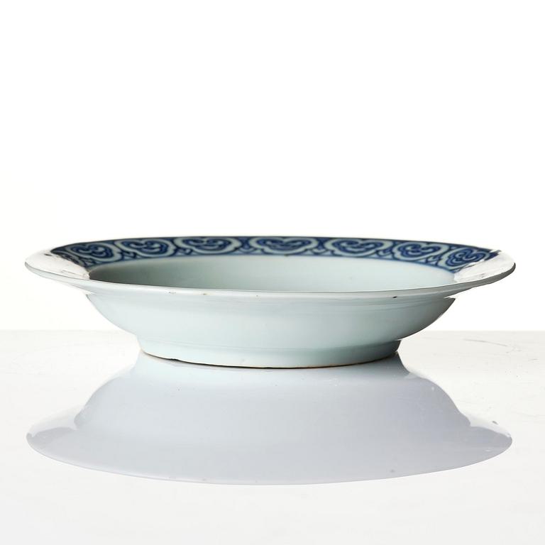 A blue and white 'floral' dish, Ming dynasty, Jiajing (1521-1566).