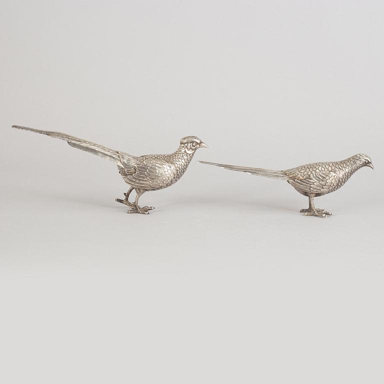 A pair of Spannish 20th century silver pheasants.