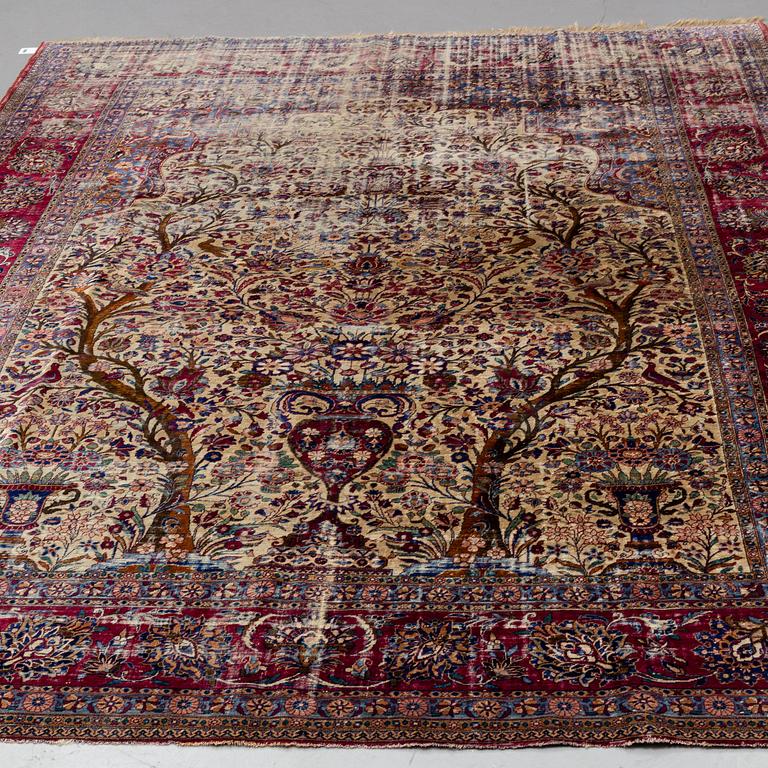A semi-antique silk Kashan, ca 316 x 205.