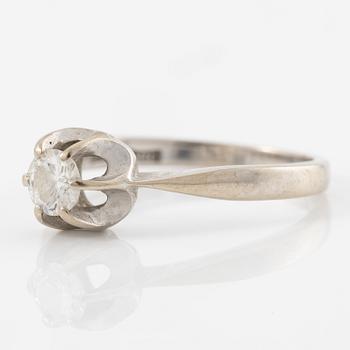 Ring in 18K white gold set with a brilliant-cut diamond.