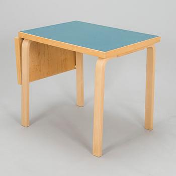 Alvar Aalto, A mid-20th century drop leaf table and three chairs for O.Y. Huonekalu-ja Rakennustyötehdas A.B.