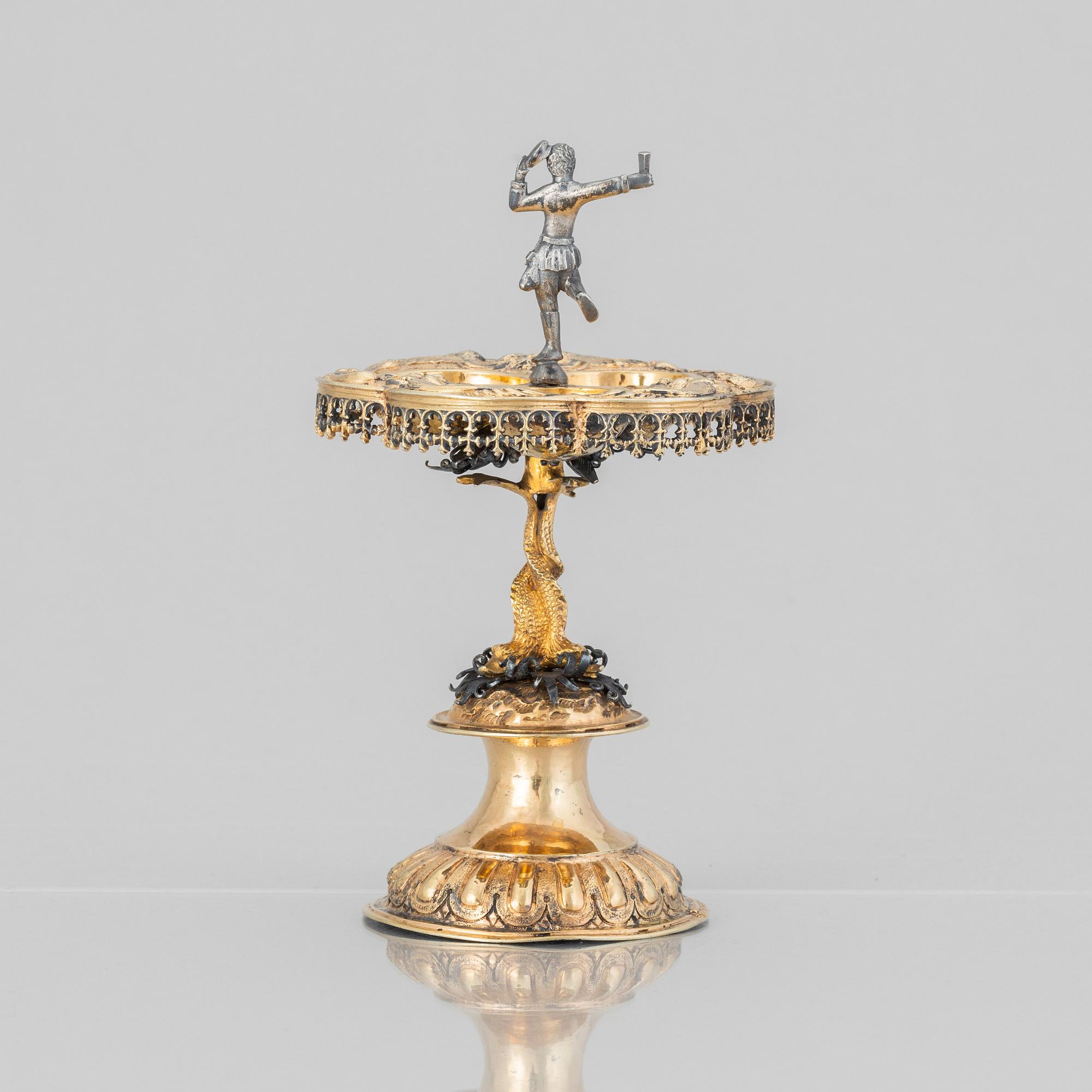A German parcel-gilt saltcellar/spice rack, makers mark Paulus Braunacker, Nurnberg, probably mid 17th Century.
