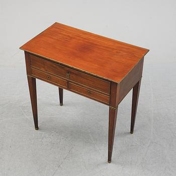 A late Gustavian mahogany tabld with drawers, end of the 18th Century.