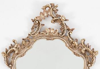 A Rococo style mirror, mid 20th Century.