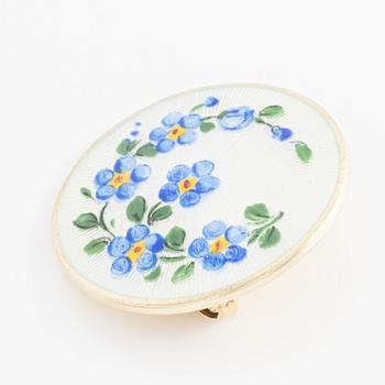 David Andersen, bracelet and two brooches, gilded silver and enamel, Norway.