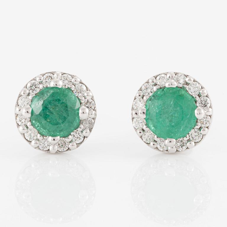 Earrings, 14K white gold with emeralds and brilliant-cut diamonds.