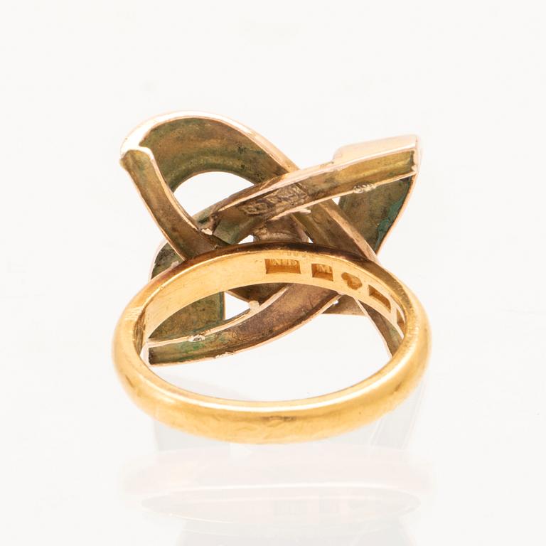 A 23K and 14K gold ring with seed pearl by Nils Berglunds Guldsmedsverkstad Malmo 1946.