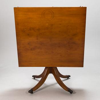 A 20th century English style dining table.