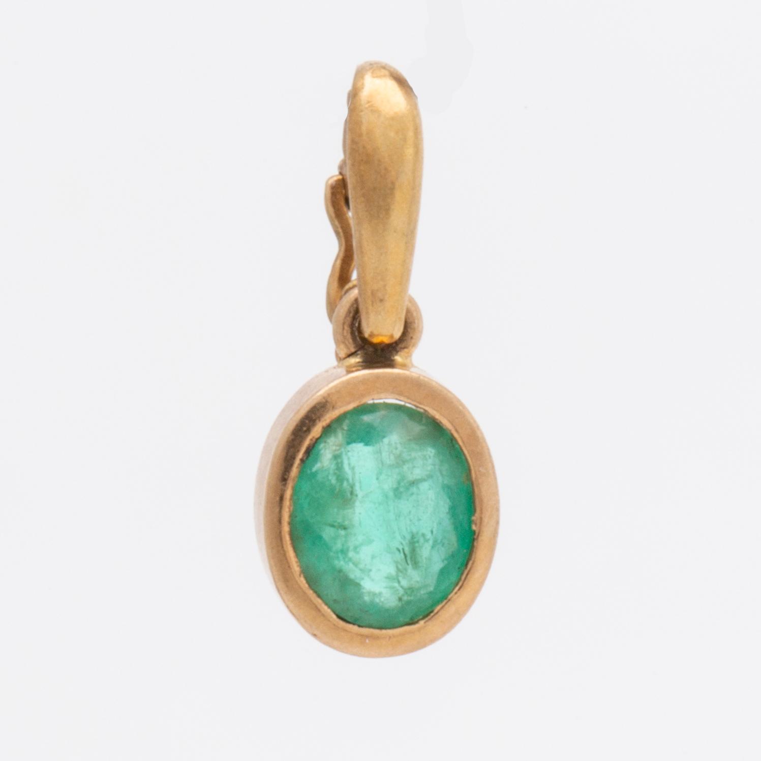 Örhängen 14K och hänge 18K guld och smaragder.