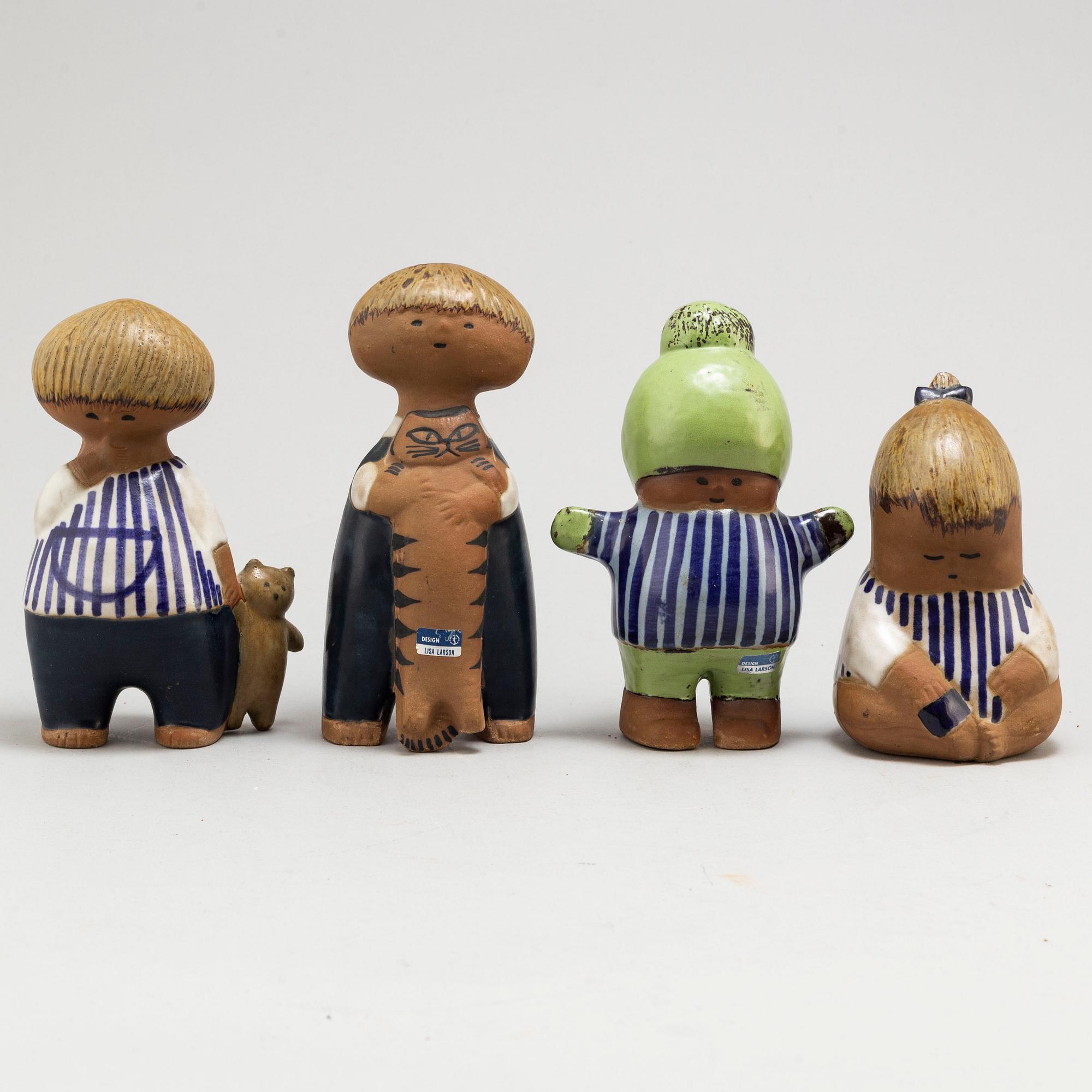 LISA LARSON, four stoneware figurines from the series 'Larsons ungar' for Gustavsberg.