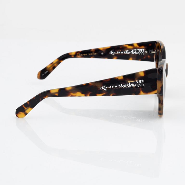 Karen Walker, a pair of tortoise "Northern lights" sunglasses.