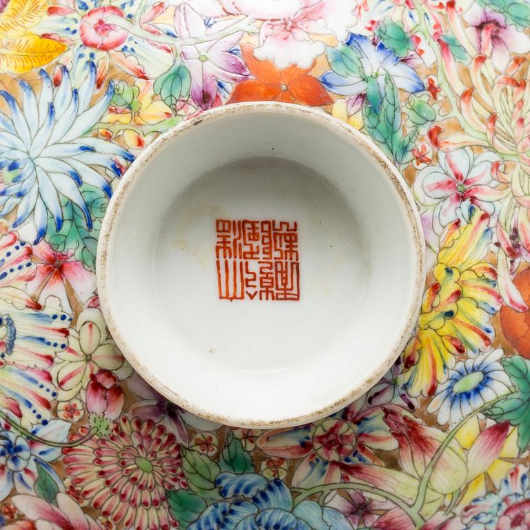 A Chinese mille fleur porcelain bowl with cover, 20th century, with Qianlong mark.