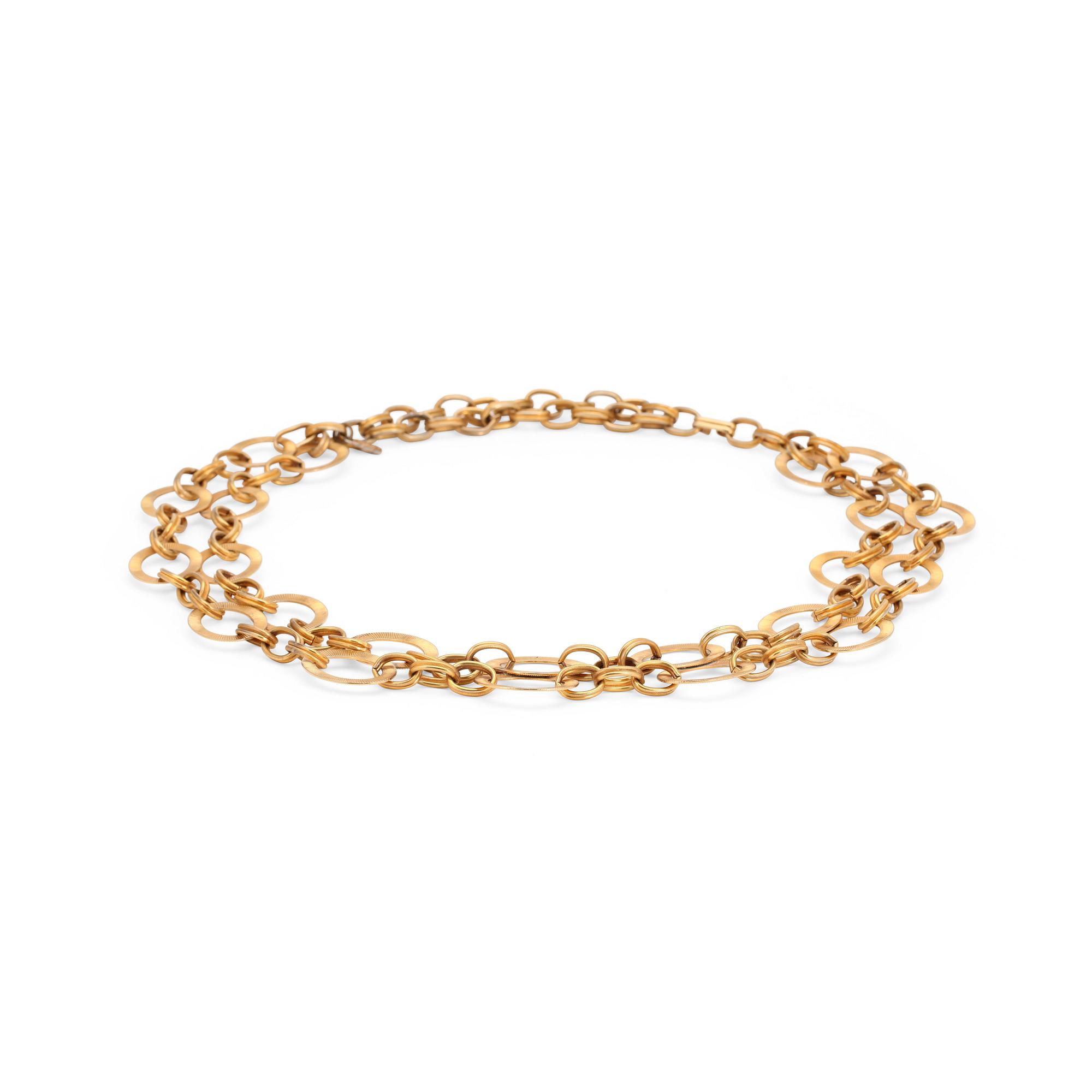YVES SAINT LAURENT, a gold colored metal chain.