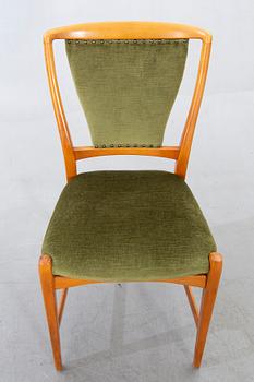 David Rosén, A table and flour chairs.