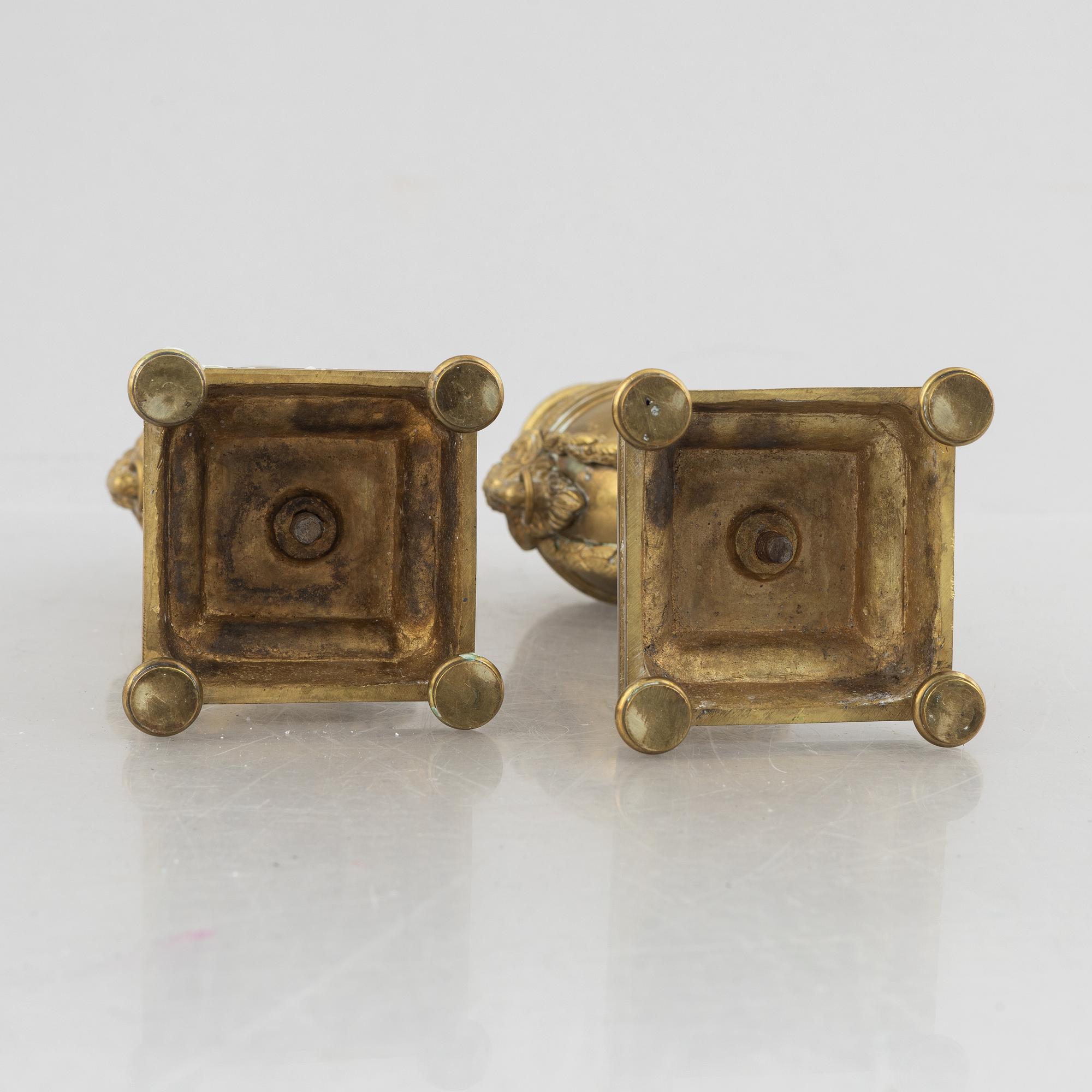 A pair of Louis XVI-style candlesticks, late 19th century.