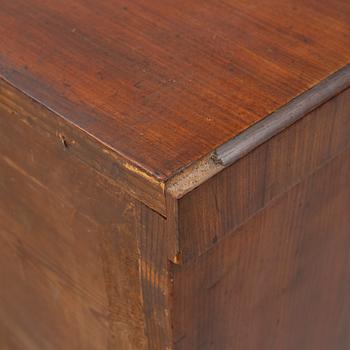 An Empire chest of drawers, first half of the/mid 19th century.