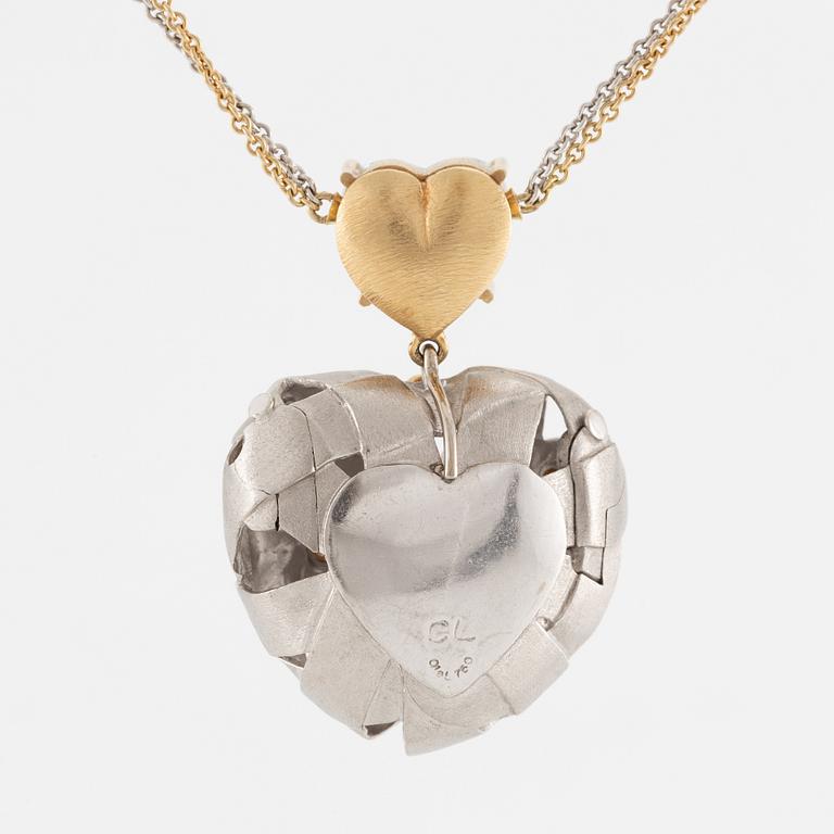 Ole Lynggaard, necklace in 18K gold and white gold with a heart-shaped aquamarine and brilliant-cut diamonds.