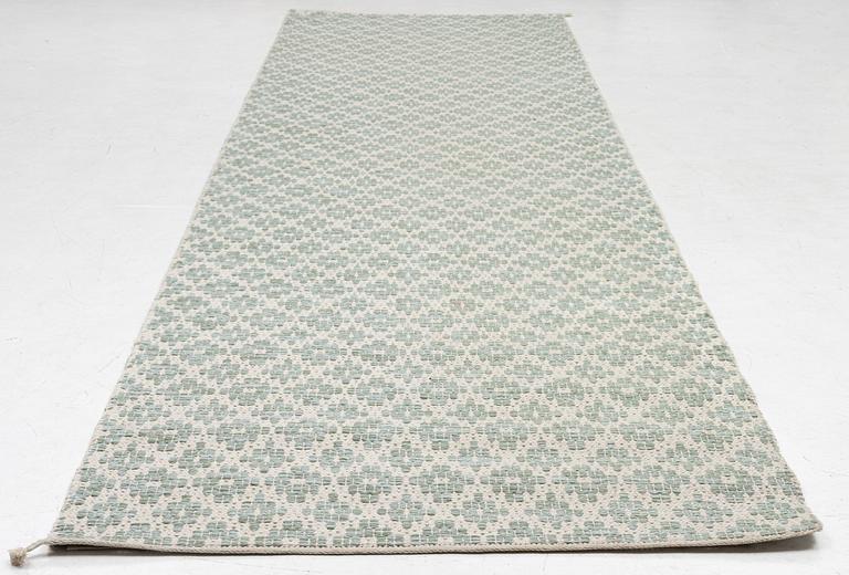 A 'Flower' runner, Vandra Rugs, c. 435 x 112 cm.