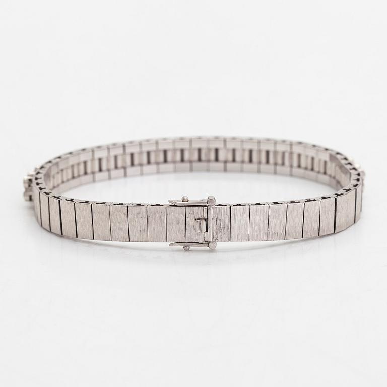 An 18K white gold bracelet, with round brilliant-cut diamonds totalling approximately 1.44 ct. Swedish import stamp.