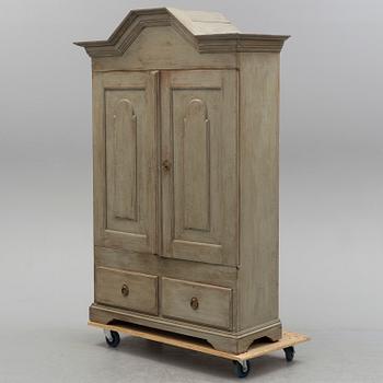 A 19th century late baroque cabinet.