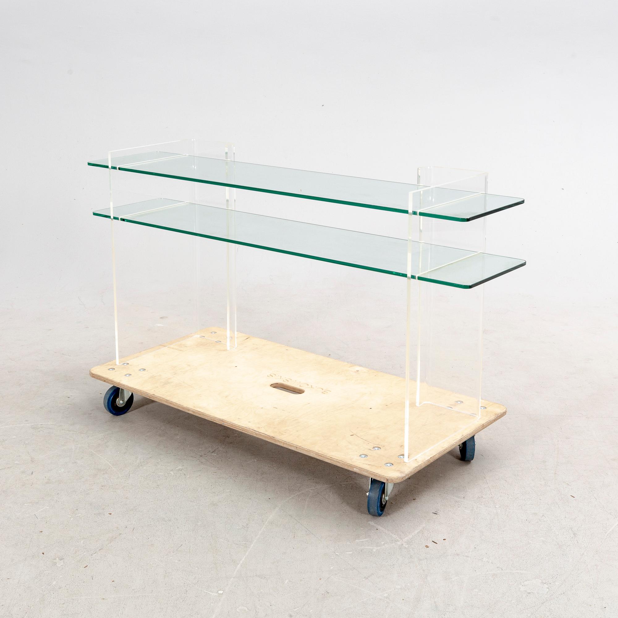 A late 20th century plexi and glass sideboard.