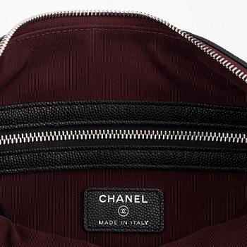 Chanel, a black caviar leather clutch, 2020.