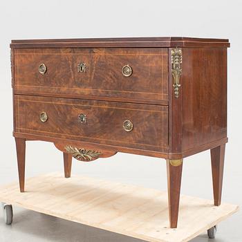 A gustavian style chest of drawers, late 19th century.