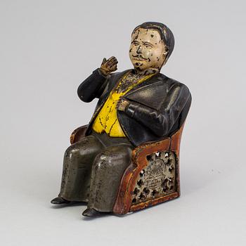 A Moneybox, cast iron, late 19th century.