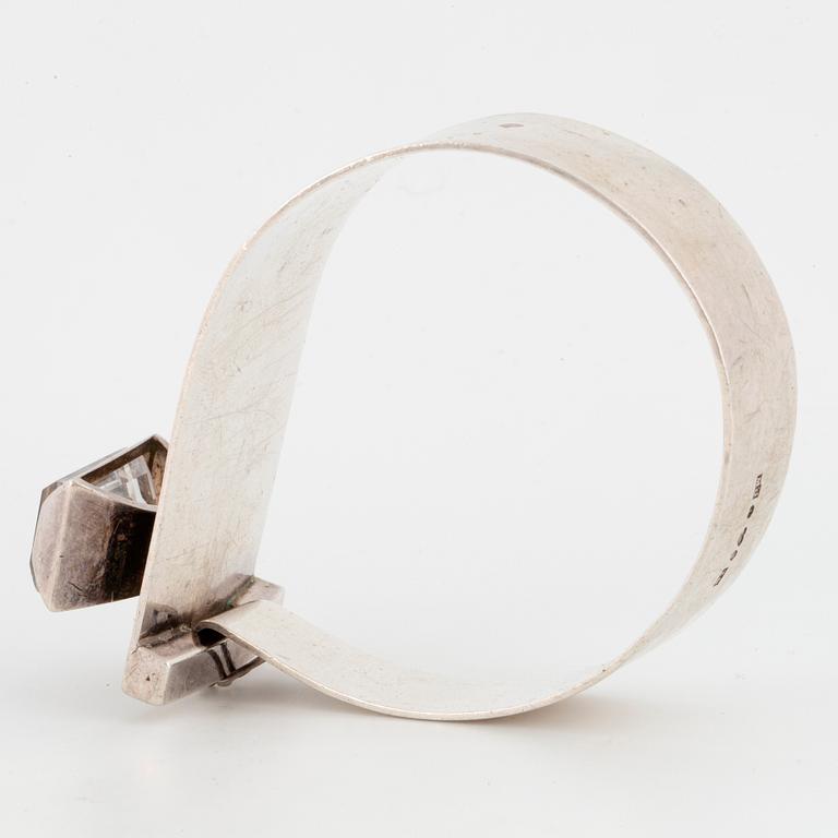 Silver and rock crystal bangle by Martin Öhman.