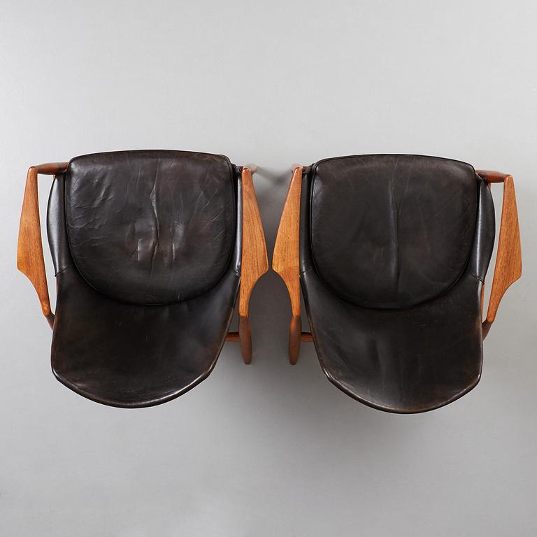 Ib Kofod-Larsen, a pair of black leather 'Sälen' easy chairs, Olof Perssons Fåtöljindustri (OPE), Sweden 1950s-60s.