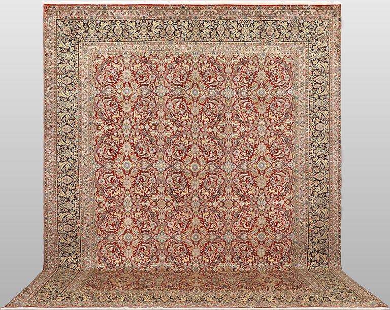 A Kirman lavar carpet, 403 x 304 cm.