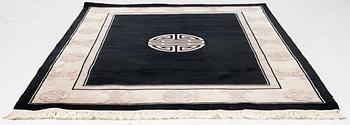A Chinese rug, approx. 231 x 170 cm.
