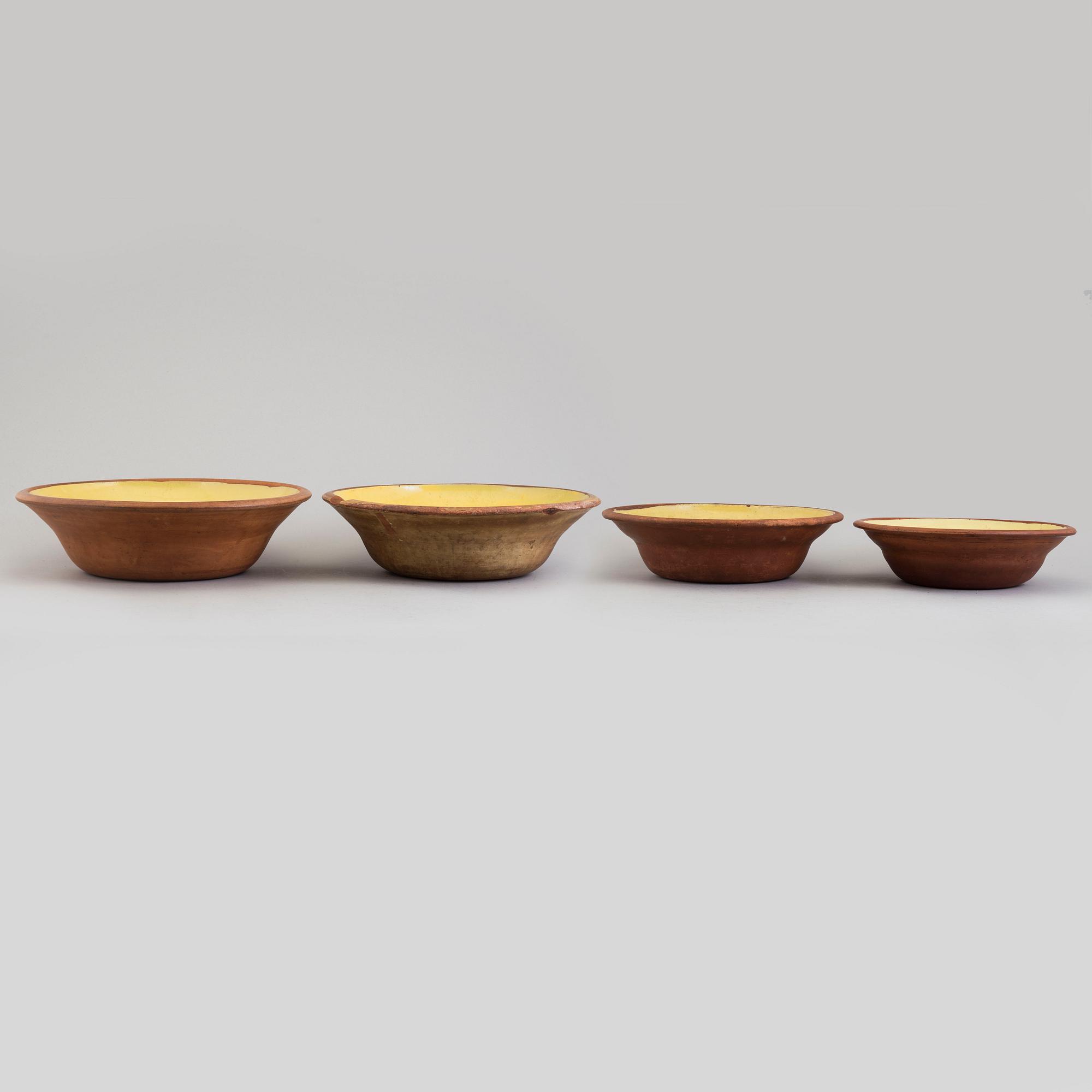 Four partially glazed eartheware bowls, Gefle, 19th Century.