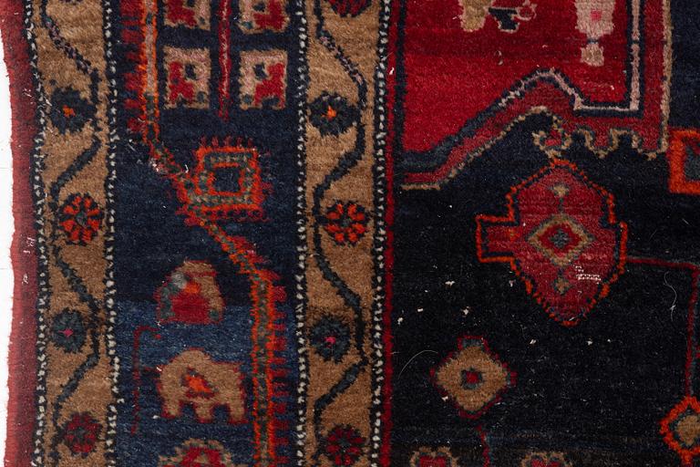 An Oriental rug, c. 282 x 154 cm.