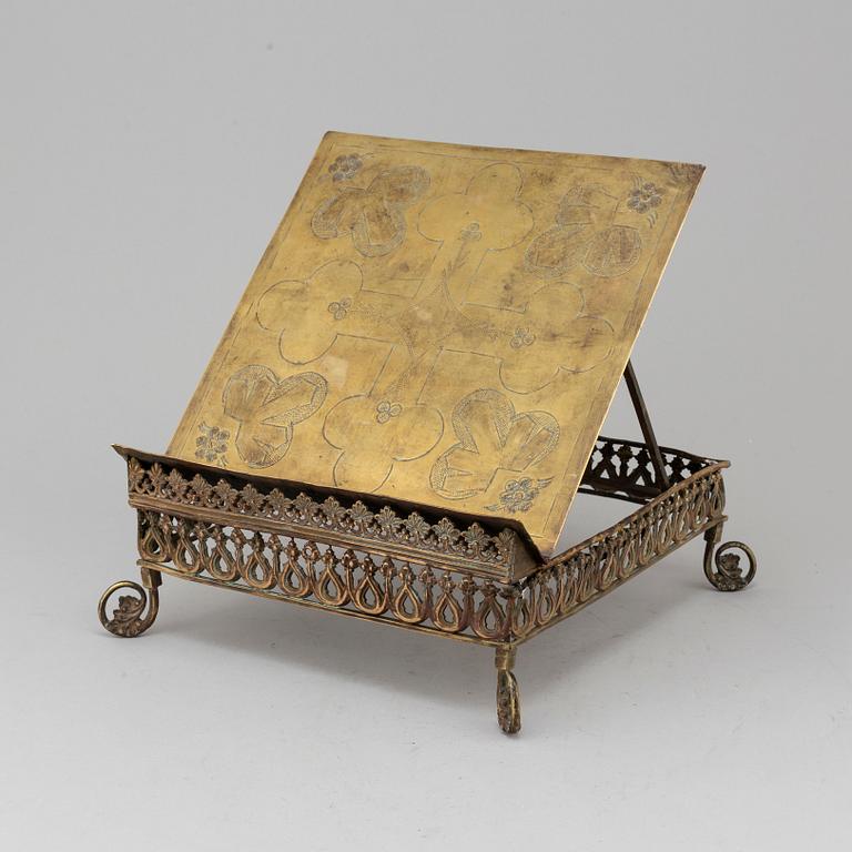 An 19th century brass book stand.