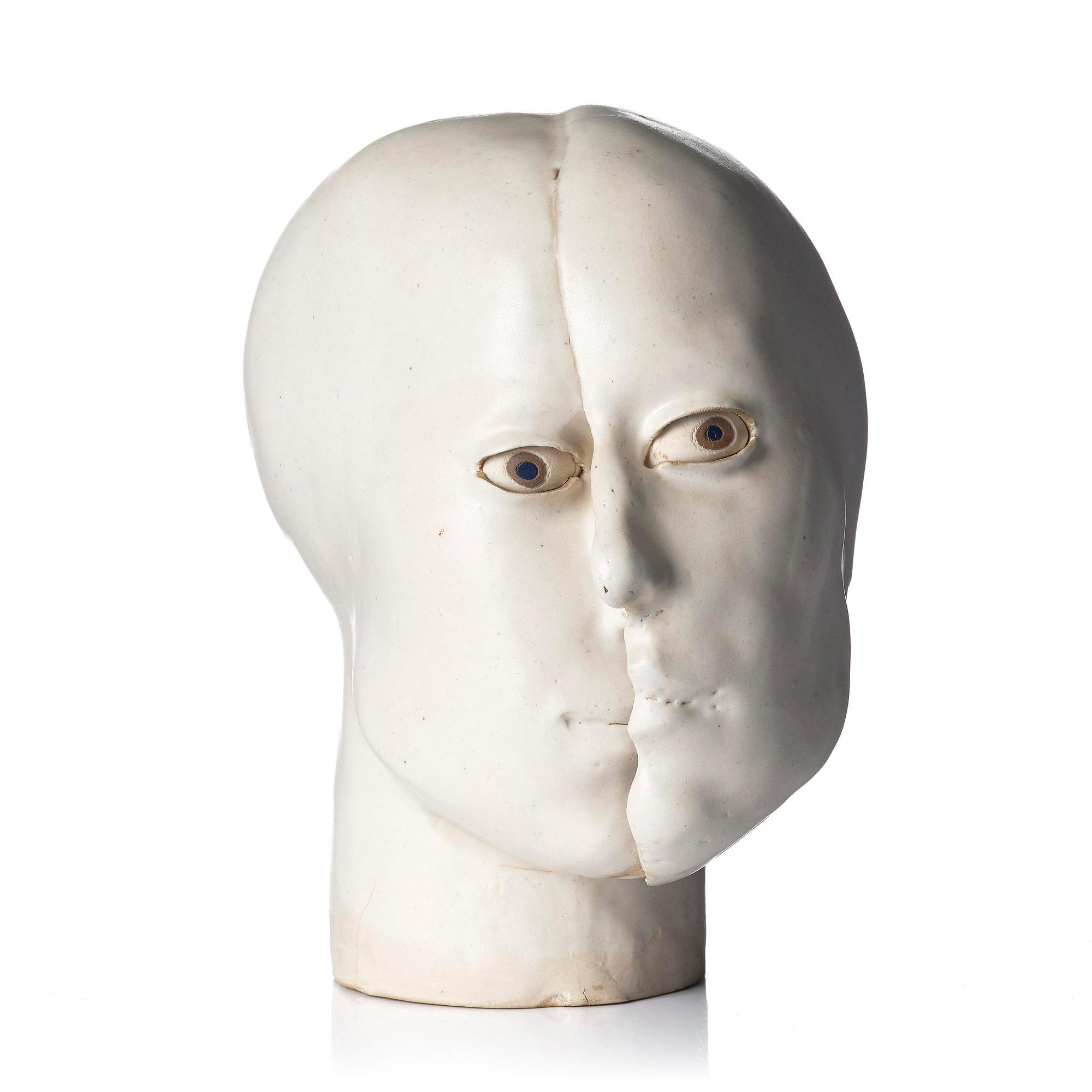 Britt-Ingrid "BIP" Persson, a glazed stoneware sculpture of faces, ca. 1970.