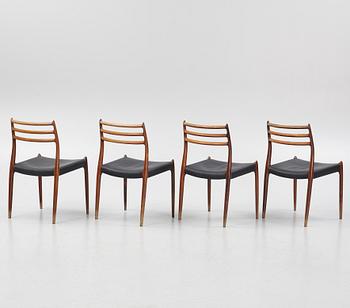 Niles Otto Møller, a rosewood veneered table with four chairs, JL Møller, Denmark, 1950's/60's.