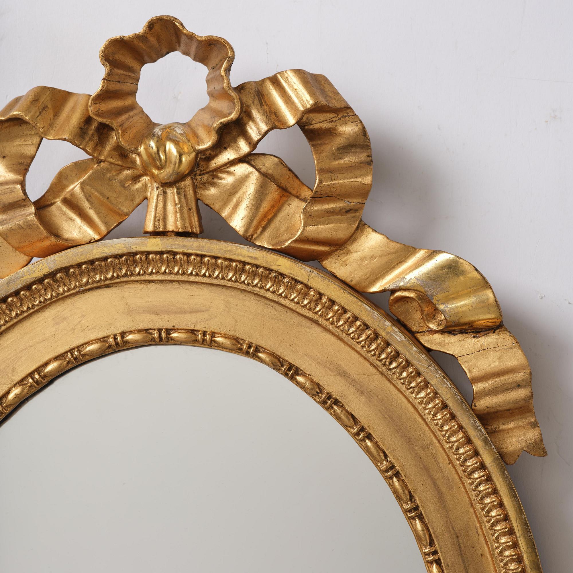 A pair of late Gustavian giltwood one light girandoles, Stockholm, circa 1800.