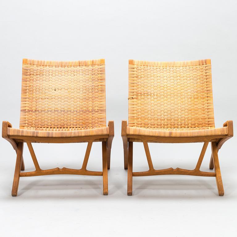 HANS J WEGNER, A pair of JH-512 folding chairs for Johannes Hansen, Denmark, early 1980s. Model designed in 1949.