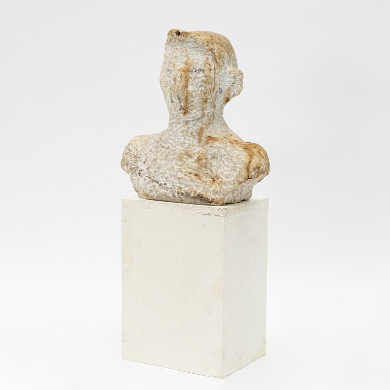 A stone sculpture, 20th century.