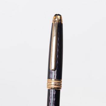 A Mont Blanc Meisterstück 90th Anniversary ed.  ballpoint pen with a case.