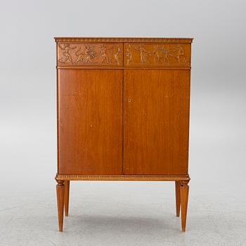 A cabinet, around the mid-20th century.