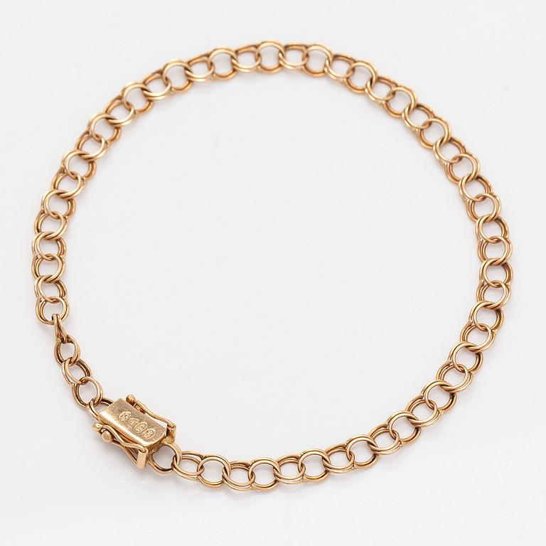 A 14K gold Bismarck necklace and bracelet.