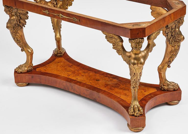 A presumably Austrian Empire centre table, early 19th century.