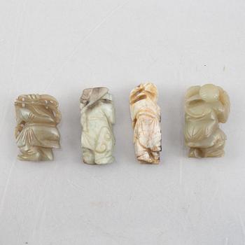 A group of four Chinese stone charms, 20th century.