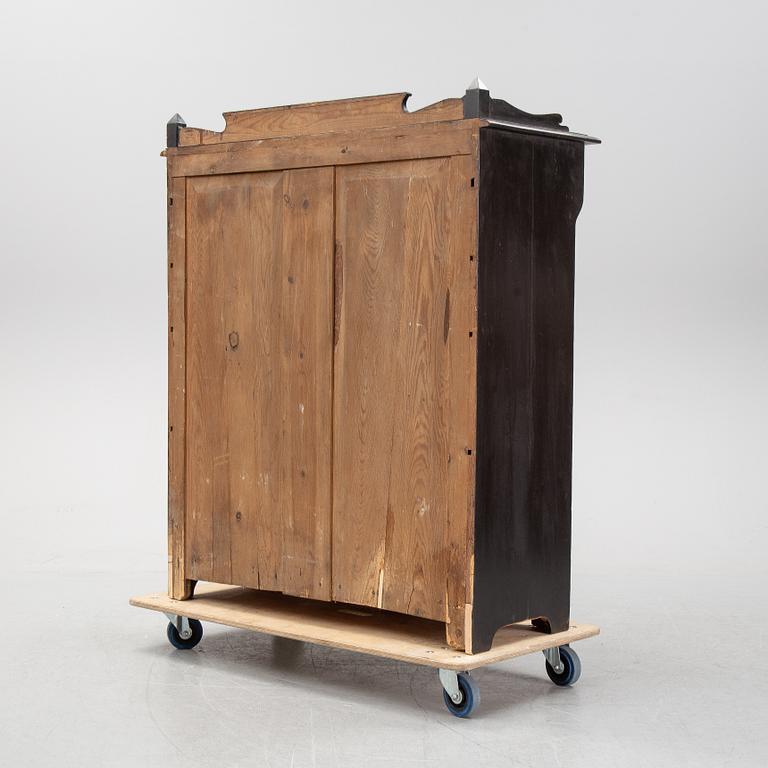 A painted cupboard, early 20th Century.